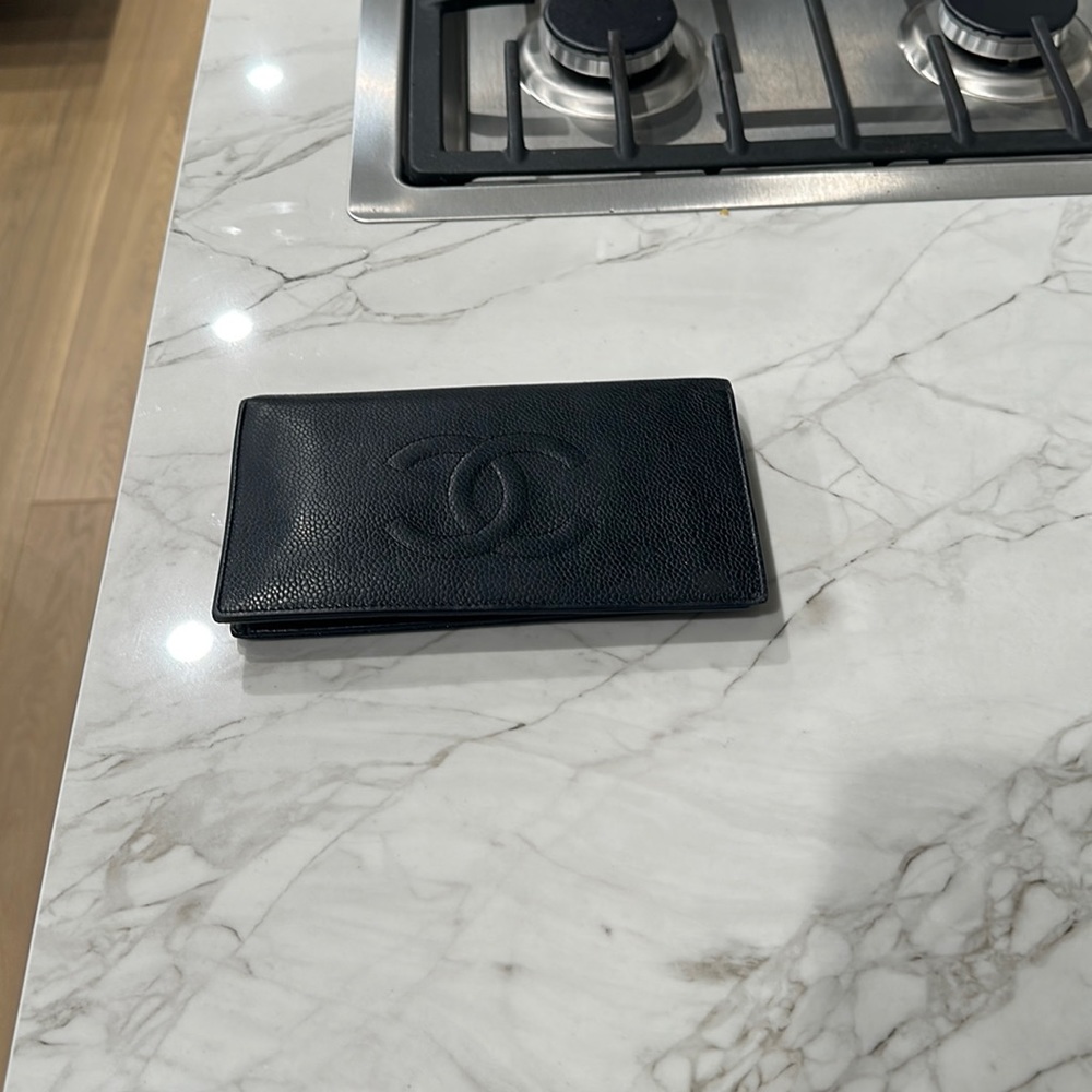 Chanel black caviar leather wallet. With original authenticity card & sticker.